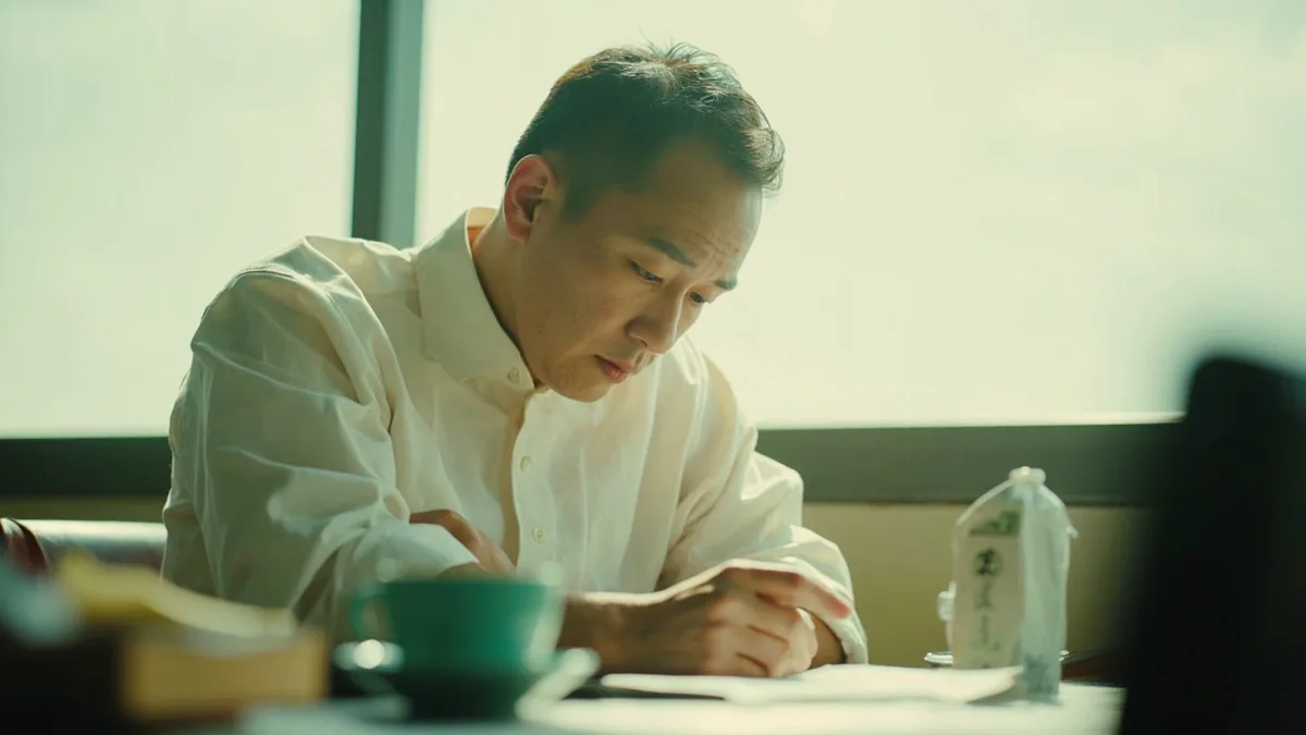 An adult's thoughtful expression, deeply absorbed in a classic Chinese story, illustrating “dream of the red chamber” in Chinese: 红楼梦 (Hónglóumèng)